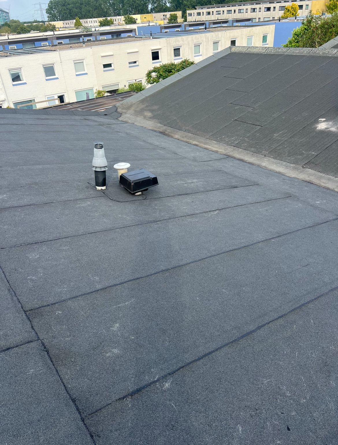 Kooymans Dakdekkers - Hellende daken specialist