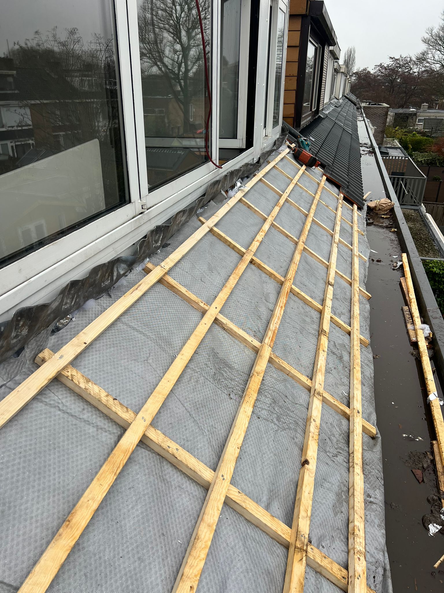 Kooymans Dakdekkers - Dakisolatie specialist