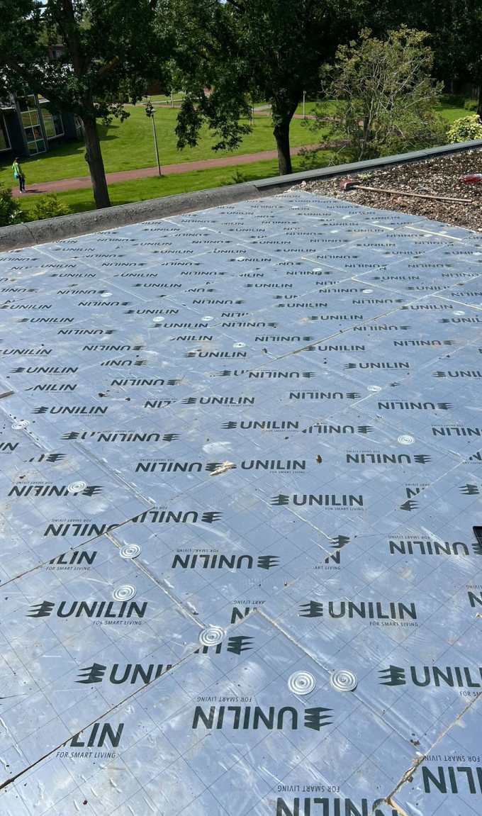 Plat dak isolatie van buitenaf